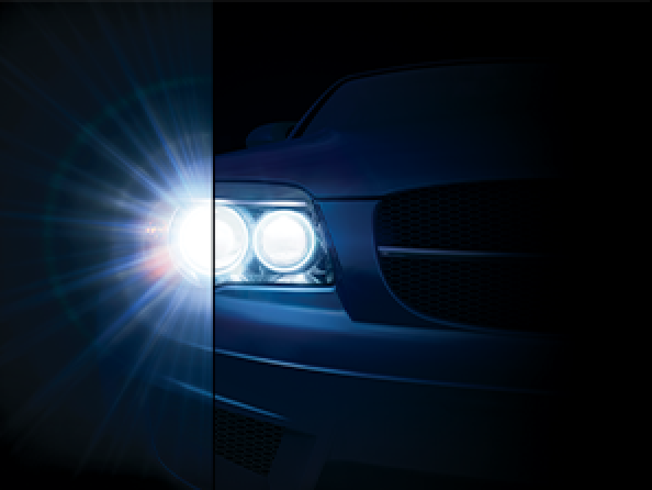An image of the headlights of a car