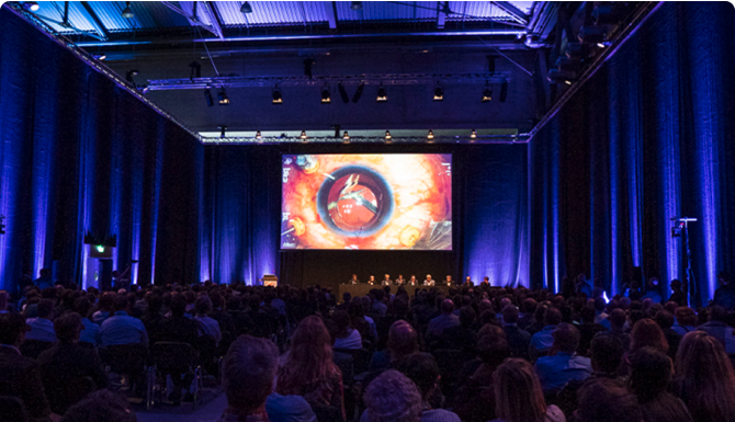 A group of people during a presentation