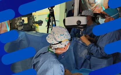 Ophthalmic surgeons performing a procedure in an operating room using a surgical microscope and advanced visualization equipment